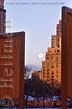 Picture of the full moon setting during sunrise by the Sheep Meadow at The Gates in Central Park, New York City, artists Christo and Jeanne-Claude, photographs and panoramas of 'The Gates, Central Park, New York City 1979-2005' copyright Carl Heilman II